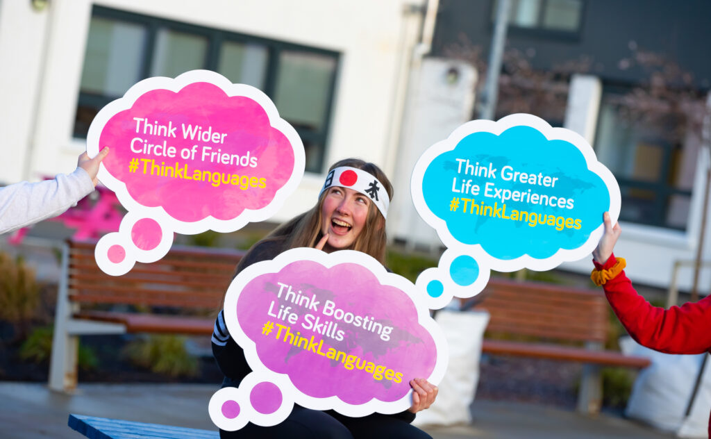 Girl with Think Languages speech bubbles