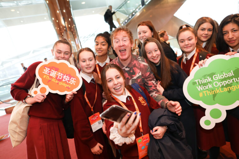 Students pose for selfie with Hector at #ThinkLanguages 2019